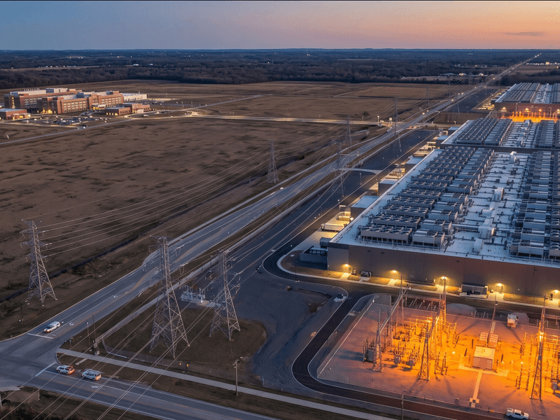 The bottleneck that governs delivery: grid interconnection capacity that commercial AI and scientific computing now compete to access.